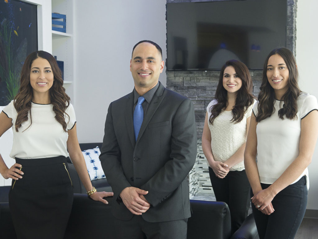 Dr. Emanuel Staes and the Villa Dental team in their San Antonio office